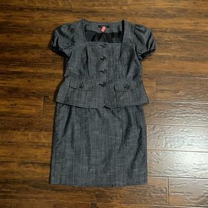 Nine West denim-colored square-necked skirt suit with button details.